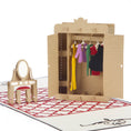 Load image into Gallery viewer, close up image of fashion lover pop up card featuring a 3D wardrobe with clothes hanging on tiny hangers inside
