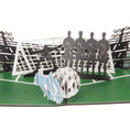 Load image into Gallery viewer, close up image of football pop up birthday card featuring a 3D football and boot taking a penalty with a line of 2D defenders and a goalkeeper
