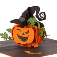 Load image into Gallery viewer, close up image of halloween pop up card featuring a spooky pumpkin wearing a witches hat
