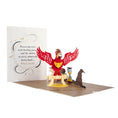 Load image into Gallery viewer, Image of Harry Potter Fawkes Pop Up Card Open with cover displayed behind
