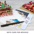 Load image into Gallery viewer, Harry Potter Christmas Pop Up Card - Lifestyle Image showing slide out notecard where the message can be written without spoiling the pop up card
