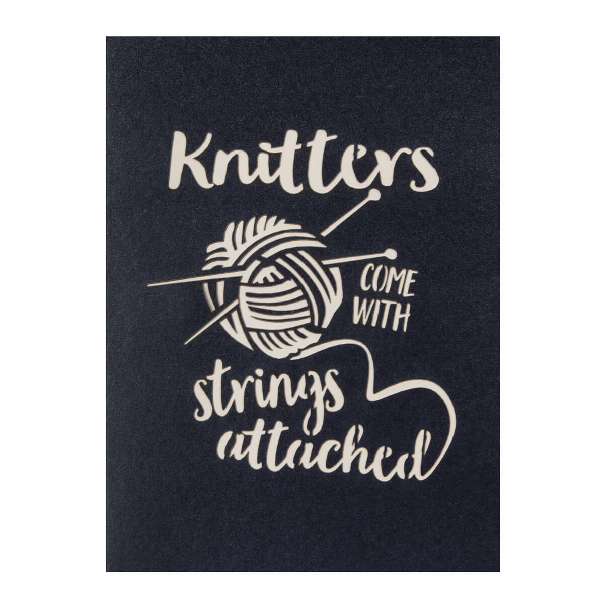 Close up image of Knitting Pop Up Card black cover which reads "Knitters Come With Strings Attached"