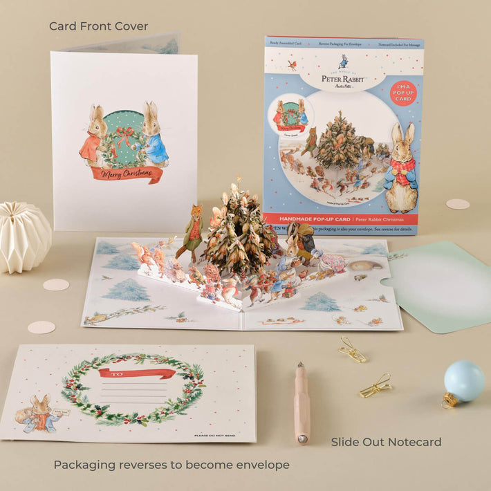 Peter Rabbit Christmas Pop Up Card - Lifestyle Image Of Pop Up Card with Envelope, Notecard, Packaging 