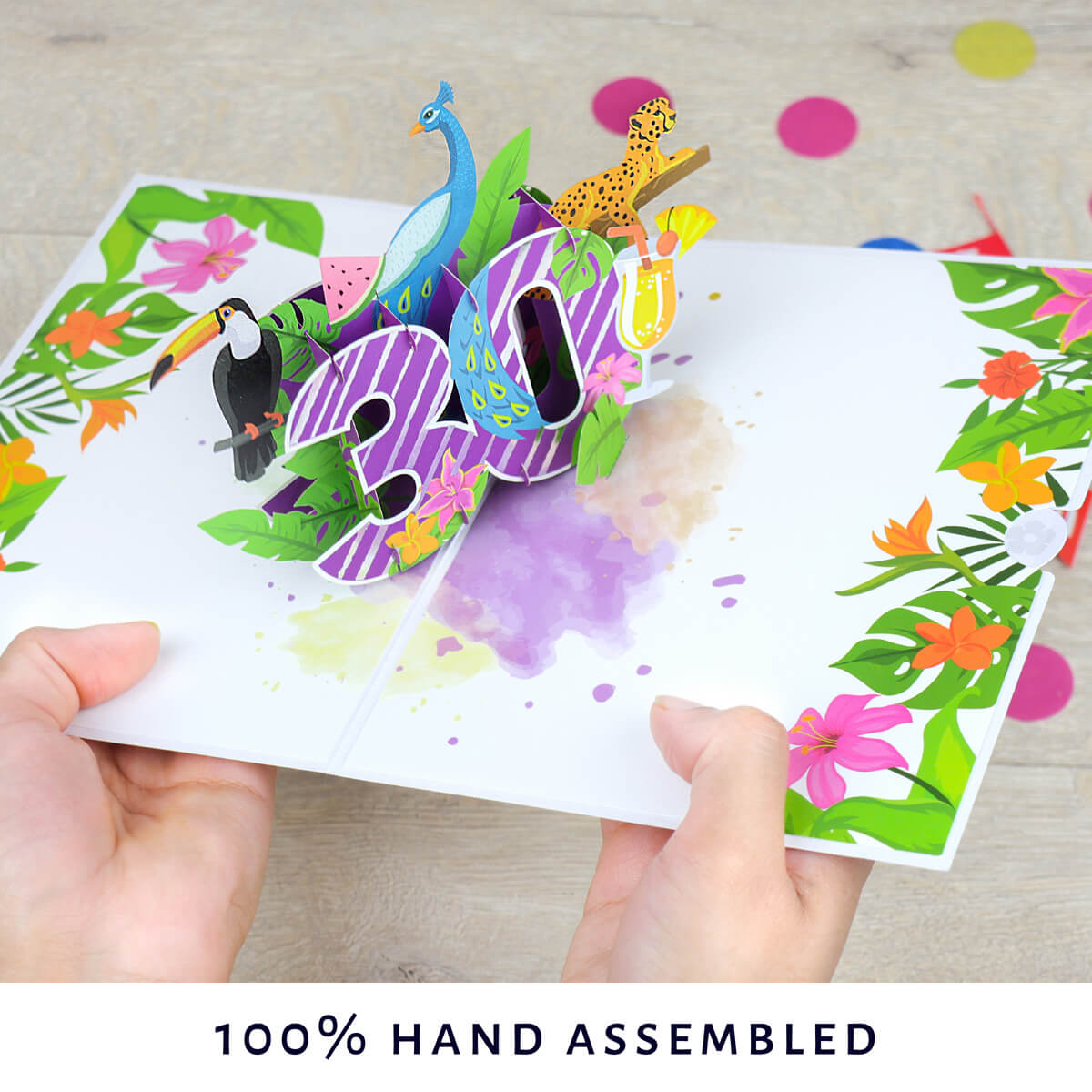 image showing hands holding the tropical 30th birthday pop up card open