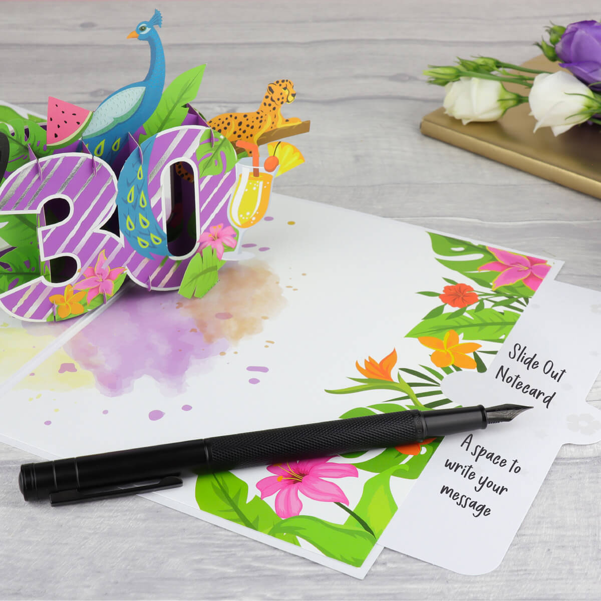 lifestyle image showing 30th birthday pop up card slide out notecard to write message on