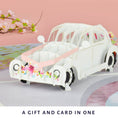 Load image into Gallery viewer, Lifestyle Image of Wedding Car Pop Up Card on pink backrop
